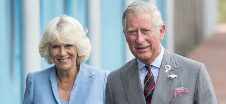 CARDIFF, WALES - JULY 03:  Prince Charles, Prince of Wales and Camilla, Duchess of Cornwall are greeted by two Daleks from the Dr Who TV series as they visit BBC Roath Lock Studios on July 3, 2013 in Cardiff, Wales.  (Photo by Mark Cuthbert/UK Press via Getty Images)