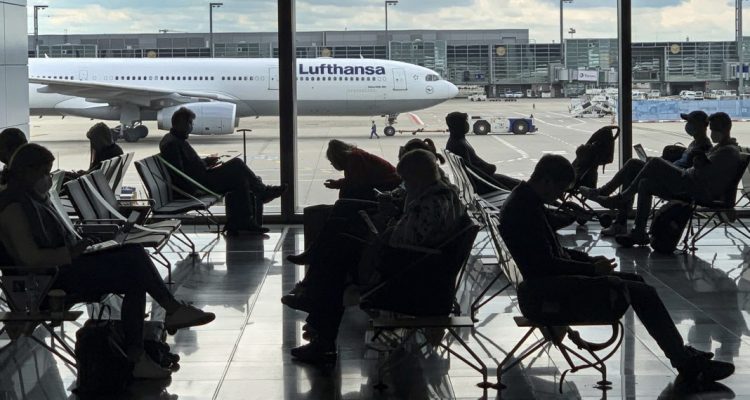 FILE -Passengers wait for their Lufthansa flight at the airport in Frankfurt, Germany, Saturday, May 15, 2021. The number of air passengers in Germany rebounded somewhat in 2021, but was still over two-thirds below pre-pandemic levels, official figures showed Monday. (AP Photo/Martin Meissner,file)